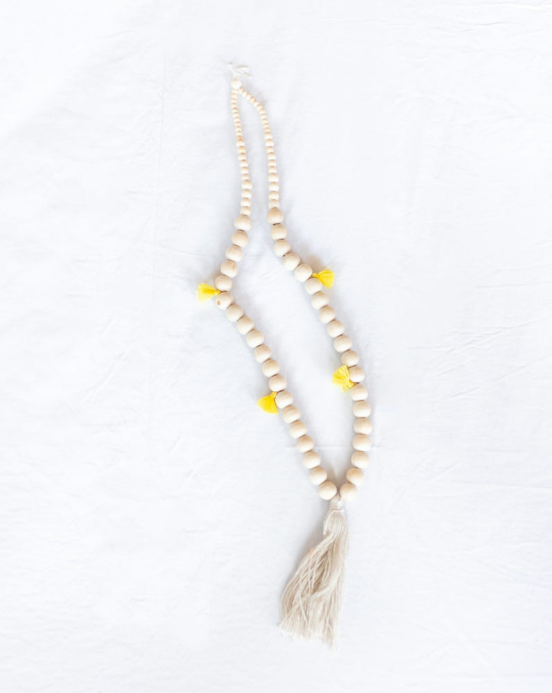 yellow beaded tassel necklace